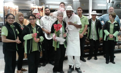 Colleagues at Asda Oadby celebrating Ruth and Andy  