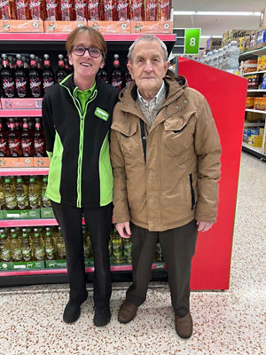 Asda customer Jimmy O'Kane with Nicola McCrory from Asda Omagh