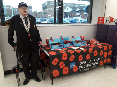 Veteran Geoff sells Poppies at Asda Peterborough