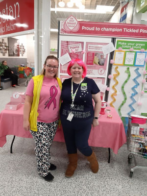 Asda Porthelthen colleagues take part in Tickled Pink pyjama party