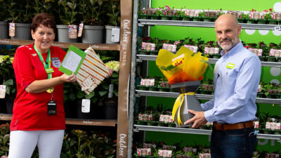 Asda CEO and president Roger Burnley says thank you to Jill Bent at Asda Radcliffe