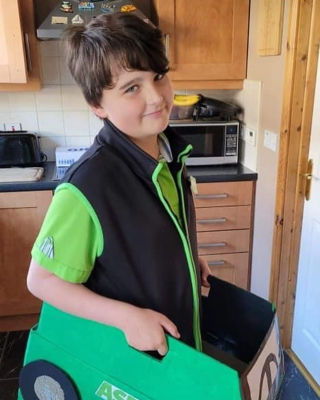 Rory Agnew dressed as an Asda Ballyclare delivery driver