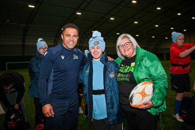 June Walker from Asda Donnington Wood and Jason Robinson Christmas surprise for Rugby Rebels