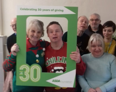 Asda Accrington present an Asda Foundation grant for £7,000 to Community Solutions North West