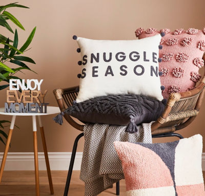 Pom Pom and slogan cushions