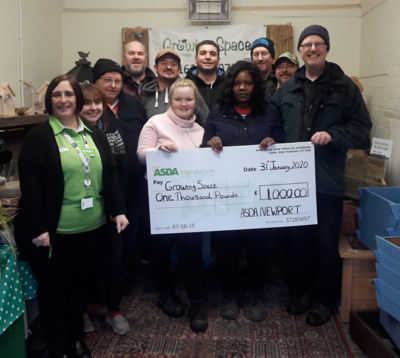 Growing Spaces in Newport receives an Asda Foundation cheque for £1,000 for winning our green token giving scheme. 