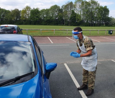 James Marrero-Allen from Asda testing people for Covid-19