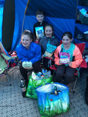 Children with Asda bags of shopping