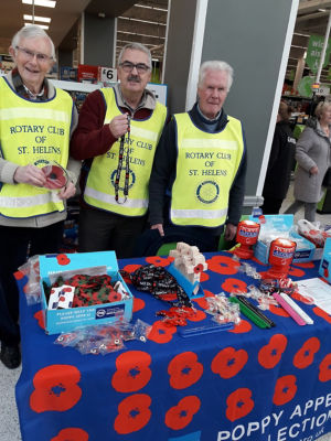 St Helens Rotary members sell poppies at Asda St Helens 