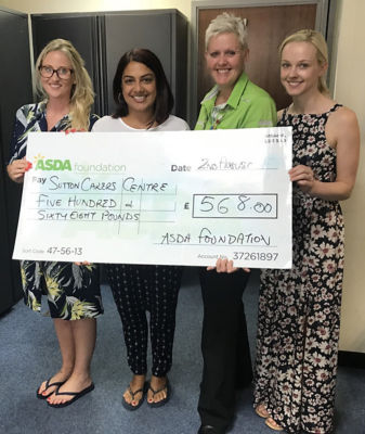Tracey Jacques from Asda Sutton presenting a Healthy Holiday Fund grant to Sutton Carers Centre
