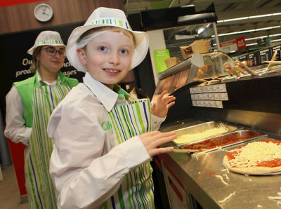 Calum making pizza