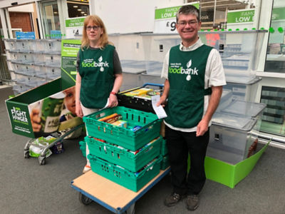 Volunteer Alice Hedge with Leeds & NW foodbank Warehouse manager Clifford Parker
