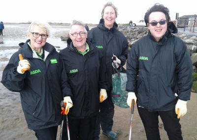 Asda colleagues litter pick on West Kirby beach