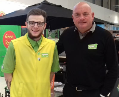 Asda Wrexham colleague Harry Jones with general store manager Shaun Leech
